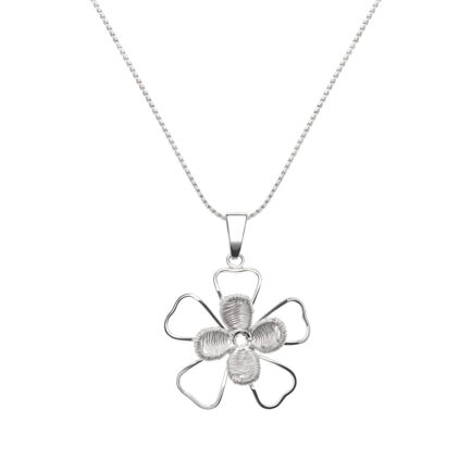 Dije flor tipo trébol con flor jardín